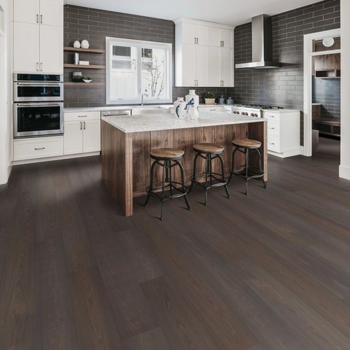 Kitchen dining area with wood-look luxury vinyl flooring from Scott's Flooring in Barrie, ON